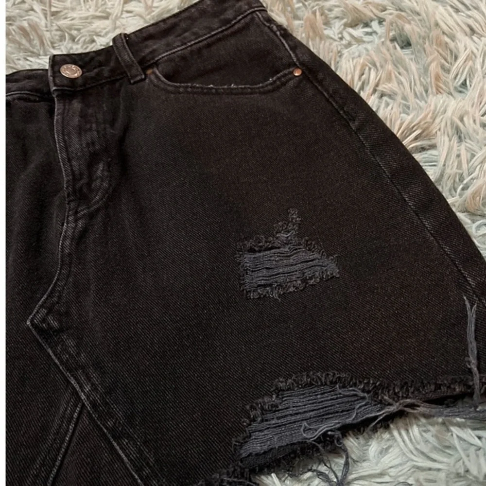 Distressed Denim Skirt